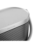 Bang & Olufsen Beosound A5 portable speaker with sleek design and fabric cover, showcasing its modern, high-quality audio device.