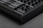 Black Erica Synths Perkons HD-01 drum machine and sampler with knobs, pads, and display, designed for electronic music production.