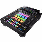 Pioneer DJ DJS-1000 DJ sampler media player with touchscreen interface and multiple control buttons, used for live electronic music performances.