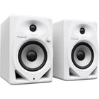 Pioneer DJ DM-50D desktop speakers, lifestyle setup, in black