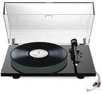 Pro-Ject T2 W turntable with wooden plinth and tonearm, showcasing its sleek design and high-quality build for vinyl playback.