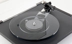 Rega Planar 6 turntable in Polaris Grey with Nd5 cartridge, showcasing a sleek design and high-quality audio components.