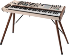 Arturia PolyBrute 12 synthesizer with a sleek control panel, multiple knobs, and a digital display showing the advanced interface.