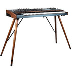 Arturia PolyBrute synthesizer with multiple control knobs and keyboard, showcasing its professional music production features.