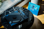 Pro-Ject Debut EVO 2 turntables, blue lifestyle shot