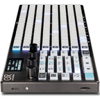 OXI Instruments One MKII Nostalgia sequencer with vintage-inspired interface and multiple control knobs, set against a dark background.