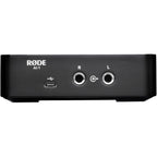 Rode AI-1 audio interface with sleek design, featuring input and output ports, used for professional audio recording and streaming.
