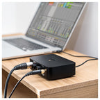 Rode AI-1 audio interface with sleek design, multiple input ports, and professional-grade audio equipment for recording and streaming.