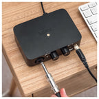 Rode AI-1 audio interface with sleek design, featuring input and output ports for professional recording and streaming.