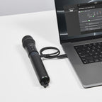 Rode Interview Pro wireless microphone accessory connected to laptop, showing user guide and setup details.