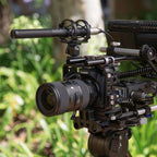 Rode NTG4 shotgun microphone mounted on a boom pole, professional audio recording equipment for clear sound capture.