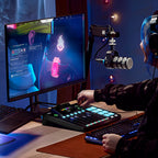 Rode RodeCaster Pro II digital mixer with customizable controls, shown in a gaming setup with colorful background lighting.