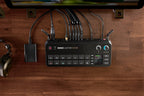 Rode RodeCaster Video editing controller with colorful RGB buttons and professional audio interface on a desk setup.