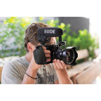 Rode VideoMic Pro Rycote camera microphone mounted on a DSLR camera for professional audio recording.