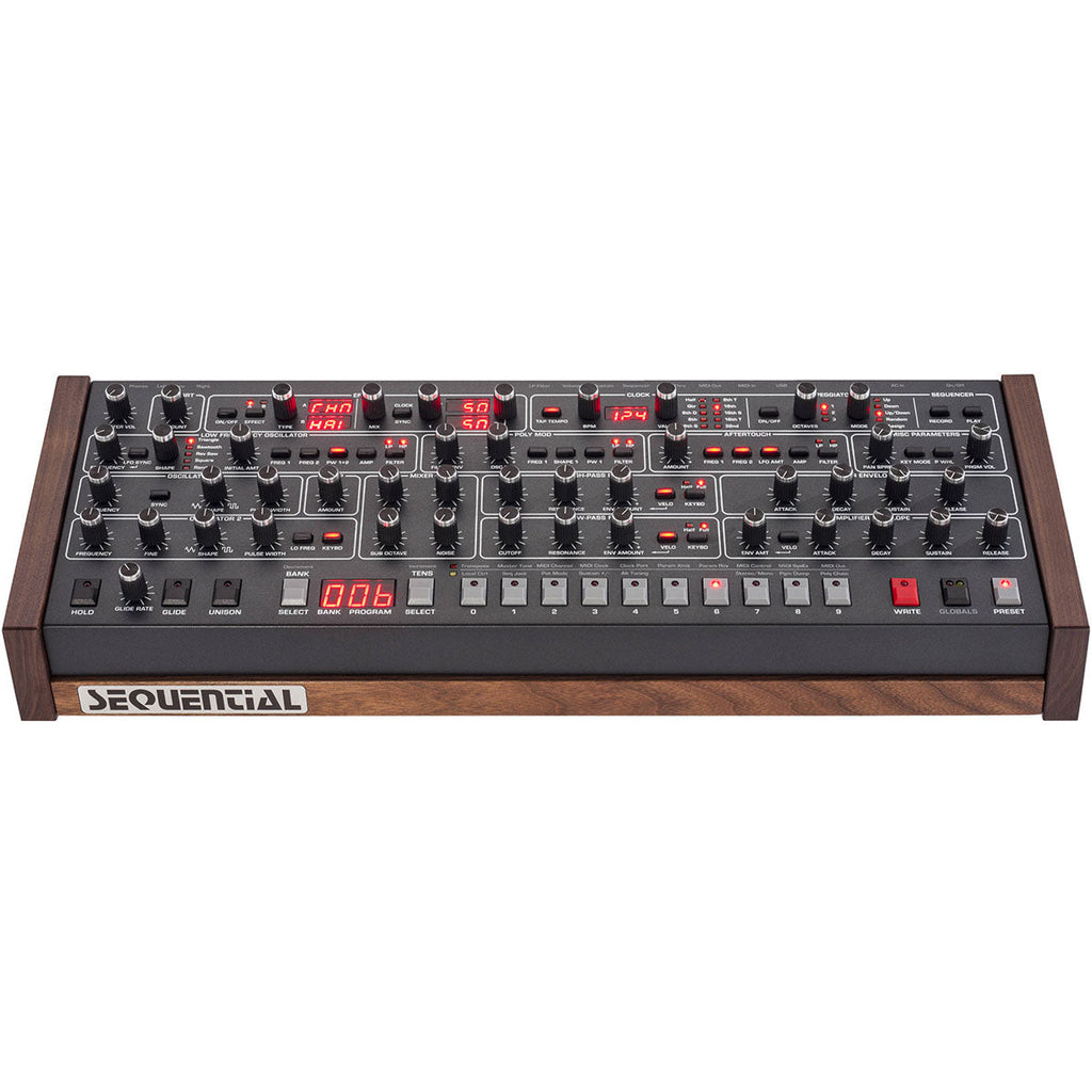 Sequential Prophet-6 Desktop synthesizer with dual oscillators and vintage-style control knobs in a sleek black finish.