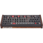 Sequential Prophet-6 Desktop synthesizer with dual oscillators and vintage-style control knobs in a sleek black finish.