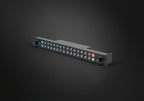 Elgato Stream Deck Studio video edit controller with customizable buttons and professional setup on a desktop.