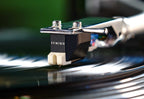 Sumiko Rainier MM phono stylus installed on a Technics 1200 turntable for optimal vinyl record playback.