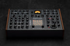 Erica Synths SYNTRX II desktop synthesizer with knobs, pads, and control interface for electronic music production.