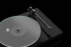 Pro-Ject T1 EVO turntable with a sleek black finish, featuring a tonearm and platter, ideal for high-quality vinyl listening.