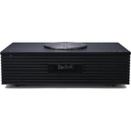 Technics SC-C70MK2 CD player with sleek design, digital display, and control buttons on top, in a modern home audio setup.