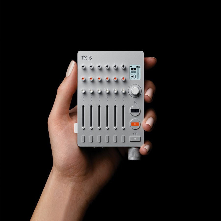 Teenage Engineering TX-6 portable mixer, compact size in hand