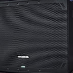 Close-up of the Mackie Thump18SV4 active subwoofer, showing its sturdy black speaker enclosure and control panel details.