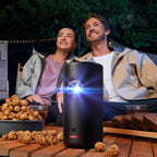 Nebula Capsule 3 Laser projector showing a vibrant image projected onto a wall with sleek black design and compact size.