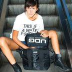 UDG StarterBag Black U9500 featuring multiple compartments for DJs, sturdy design, and comfortable shoulder straps.