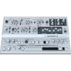 UDO Audio Super 6 Desktop synthesizer front view showing its control panel, knobs, and keyboard layout.