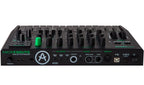 Arturia MicroBrute UFO keyboard synthesizer with control knobs and input/output ports on the back panel.