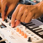 Arturia MicroFreak Vocoder Edition synthesizer with colorful keyboard and control panel, showcasing its compact design and vibrant interface.