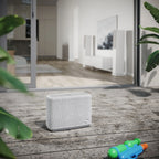 Light grey Audio Pro A15 portable speaker with wireless multiroom audio, AirPlay 2, Google Cast, and Chromecast features.