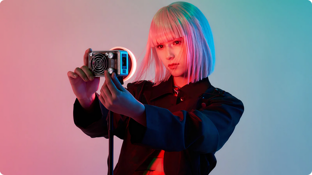 Zhiyun Molus X60 RGB Pro light showing adjustable color spectrum and bright LED panel for professional photography and videography.