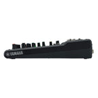 Yamaha MG10 analog mixer with multiple input channels, knobs, and sliders for audio mixing and sound control.